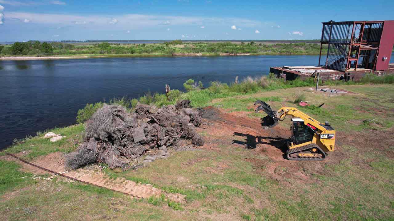 Deteriorated breakwaters piled at Lightning Point in Bayou La Batre