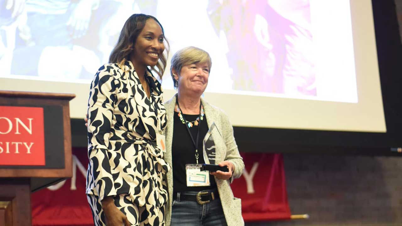 NMEA President Lindsay Patterson presents Dr. Tina Miller-Way the 2024 Individual National Marine Education Award.